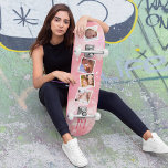 Skateboard Collage de photos de famille rose féminin<br><div class="desc">Le skateboard est le cadeau idéal pour les femmes branchées et familiales d'aujourd'hui. D'un point de vue esthétique, il est conçu pour être accrocheur et attrayant pour les goûts féminins - avec un fond texturé rose lisse et délicat, entouré d'étoiles blanches et personnalisé avec quatre photos de famille et une...</div>