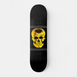 Skateboard crâne doré