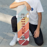 Skateboard Custom Name Cool Retro Sunset Stripes<br><div class="desc">Custom Name Cool Retro Sunset Stripes Skateboard features your personalized name on a retro sunset stripes in burgundy, orange, yellow and blue on a wooden background. Personalize by editing the text in the text box provided. Give a custom made gift, personalized skateboard to your favorite skateboarder for Christmas, birthday or...</div>