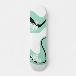 Skateboard Daisy Groove en vert, noir et blanc