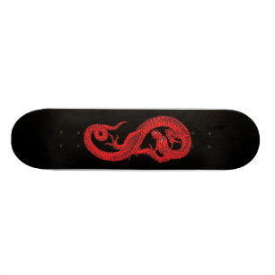 Skateboard Dragon rouge sur le noir