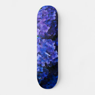 Skateboard fleurs bleues