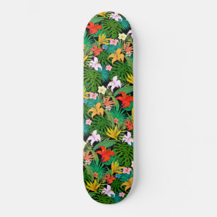 Skateboard Fleurs multicolores et feuilles de palmier sur fon
