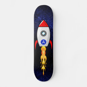 Skateboard fusée spatiale et monogramme sur galaxie