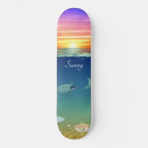 Skateboard Lever de soleil, tortue de mer et coquillages