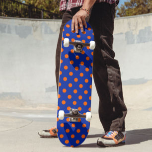 Skateboard Modèle de conception de points orange sur fond ble