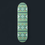 Skateboard Motif vert bleu tribal géométrique moderne<br><div class="desc">Le skateboard à motif vert et bleu tribal géométrique moderne comporte un motif géométrique coloré en vert,  bleu,  orange et blanc. Conçu par ©Evco Studio www.zazzle.com/store/evcostudio</div>