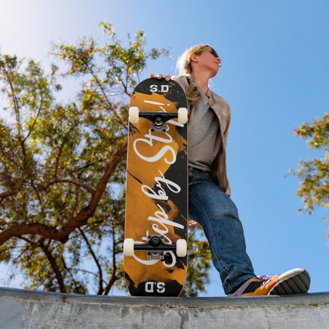 Skateboard Noir orange brossé (Extérieur 1)