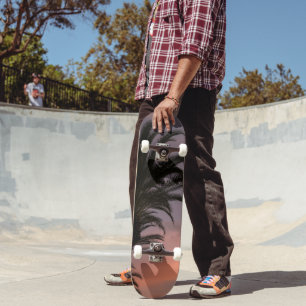 Skateboard Palmier du coucher de soleil des Caraïbes rose vio