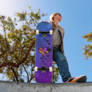 Skateboard Papillon noir sur Rainbow Heart