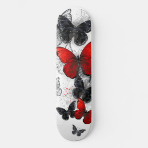 Skateboard Papillons noirs et rouges volants