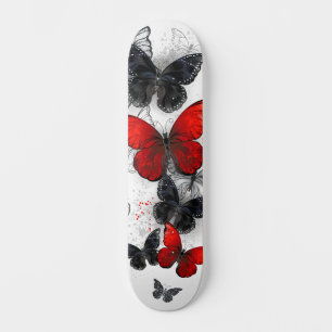 Skateboard Papillons noirs et rouges volants