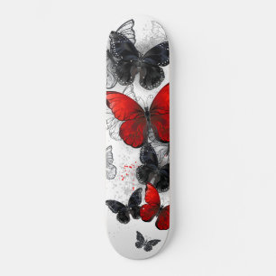 Skateboard Papillons noirs et rouges volants