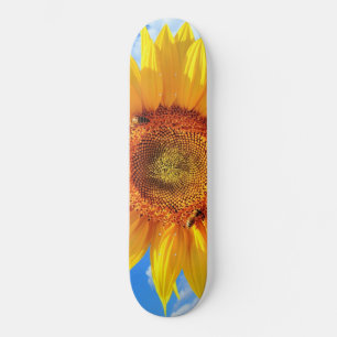Skateboard Tournesol et abeilles sur le ciel bleu - Joie d'ét