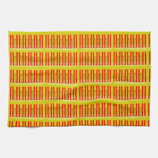 Skis rouges sur serviette de cuisine jaune (Horizontal)