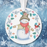 Snowman avec Red Bird Wreath Kids<br><div class="desc">Cet ornement de Fêtes a un bonhomme de neige heureux tout habillé dans son chapeau haut, foulard d'hiver, veste et mitaines. Avec un grand sourire sur le visage, il regarde un petit oiseau cardinal rouge qui est perché dans une feuille bleue et une couronne de baies rouges. Le dos de...</div>