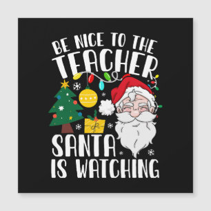 Sois gentil avec le professeur, le Père Noël regar