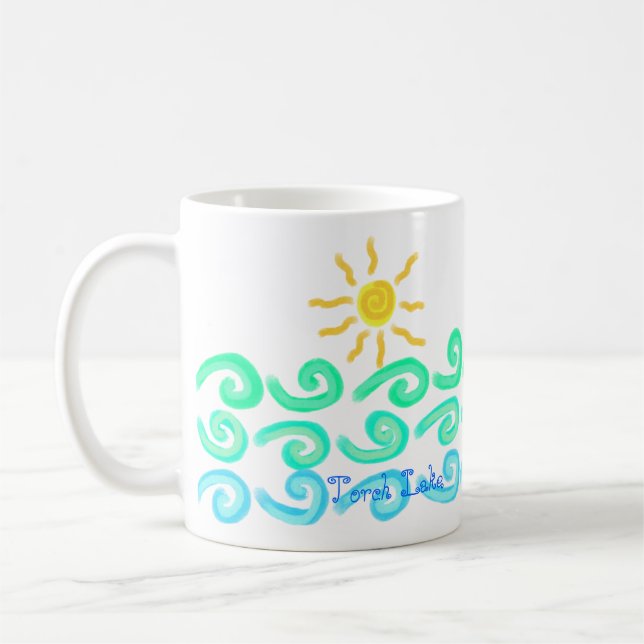 Soleil sur la tasse de café de lac torch (Gauche)