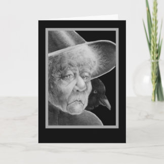 Sorcière avec la carte de Halloween de corneille
