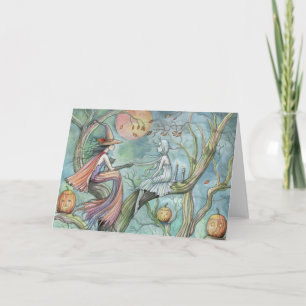 Sorcière et fantôme de la carte d'Halloween