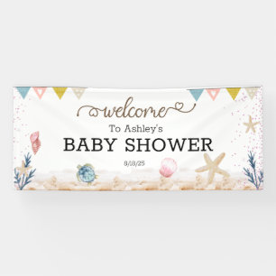 Sous la bannière de bienvenue du Baby shower de la