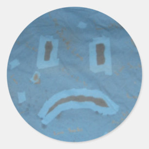 Sticker à visage triste