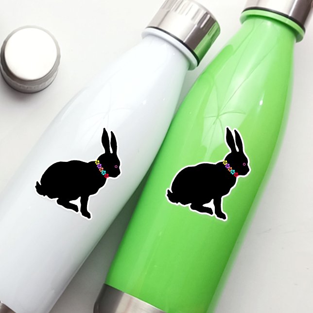 Sticker Bague de fleurs en silhouette noire printemps (Sitting spring time or Easter black silhouette rabbit wearing colourful flowers on vinyl sticker.)