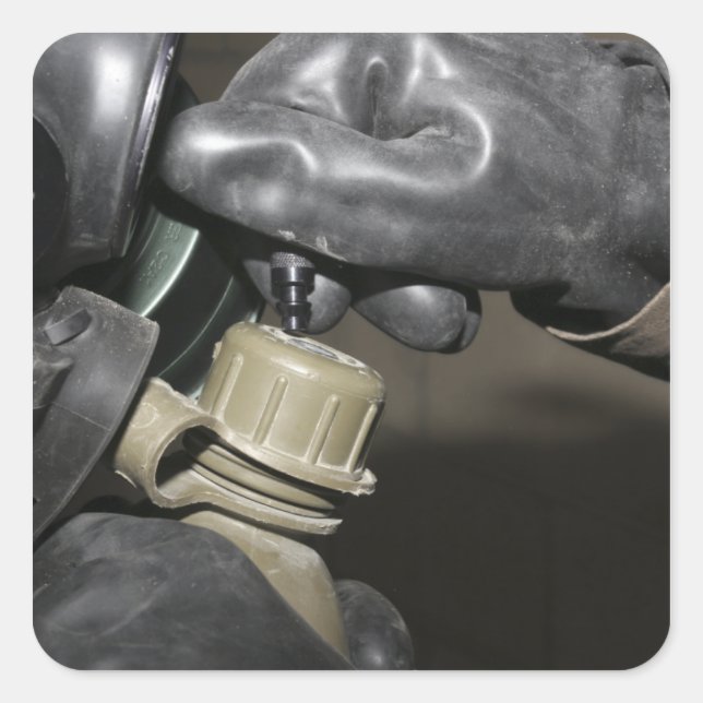 Sticker Carré A Marine insère un tube à boire dans sa cante (Devant)