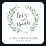 Sticker Carré Amour et Merci Rustic Wreath Fête des mariées Favo<br><div class="desc">Les autocollants de la douche de mariée à thème botanique arborent le message "Amour et Merci" à l'intérieur d'une couronne de verdure rustique avec des feuilles aquarellés avec votre nom, titre de l'événement et date, sur un arrière - plan blanc. Ces autocollants sont une excellente façon d'ajouter une touche personnelle...</div>