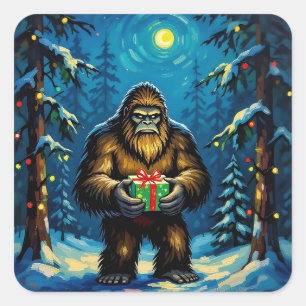 Sticker Carré Bigfoot drôle tenant un cadeau de Noël