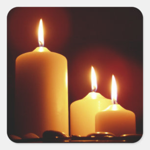 Sticker Carré Bougies lumineuses avec une lueur rouge, paisible