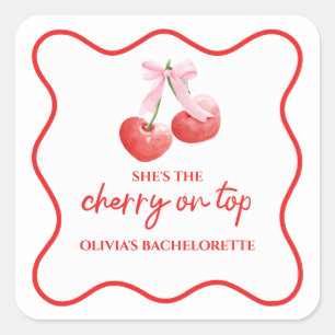 Sticker Carré Cerise sur le dessus avec un nœud papillon rose po