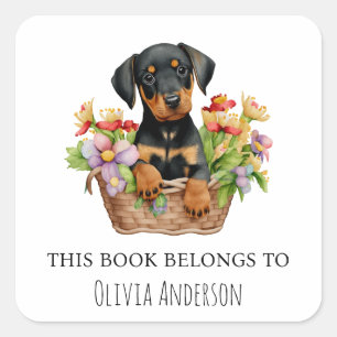 Sticker Carré Chiot de Doberman dans le panier à fleurs Ce livre