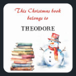 Sticker Carré Christmas Snowman Kids Ce Livre Appartient À Nomme<br><div class="desc">Inspirer l'émerveillement de lire ce Noël, avec ce mignon autocollant de plaque d'immatriculation. Les mots sont "Ce livre de Noël appartient à" en typographie de script rouge, suivi du nom du destinataire (cliquez sur "Personnaliser" pour entrer le nom que vous souhaitez). L'autocollant festif est décoré d'une photo en aquarelle d'un...</div>