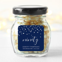 Confettis argent sur fond bleu marine pour 90e ann