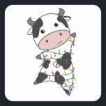 Sticker Carré Cow Cheerful Christmas Winter Animals<br><div class="desc">The cow at Christmas with fairy lights. Funny animals with toxits and snow for the holidays. Donc Funny for Christmas in July. Cows are cute animals et perfect pour Christmas.</div>