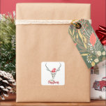 Sticker Carré Crâne de rennes rustiques et Père Noël Ha Christma<br><div class="desc">Amusants et festifs, ces autocollants sont la façon parfaite d'envoyer des salutations de joie de vacances ou de sceller des gâteries de vacances. Le design comprend un crâne de rennes avec un chapeau de Père Noël rouge et le texte "joyeux Noël" qui peut être changé pour s'adapter à vos besoins...</div>