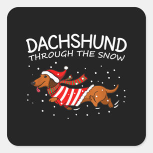 Sticker Carré Dachshund à travers la neige drôle chien Noël