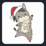Sticker Carré Donkey Christmas Donkeys<br><div class="desc">The donkey for Christmas with fairy lights. Funny animals with toxits and snow to the holidays. Donc Funny for Christmas in July. Donkeys are sweet animals and perfect for Christmas.</div>