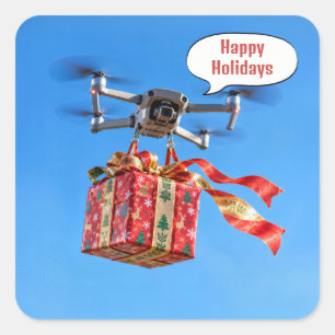 Sticker Carré Drone livrant un cadeau de Noël