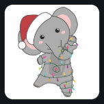 Sticker Carré Elephant Christmas Snow Winter Animals<br><div class="desc">L'éléphant de Christmas et les fairy lights. Funny animals with toxits and snow for the holidays. Donc Funny for Christmas in July. Elephants are cute animals and perfect pour Christmas.</div>
