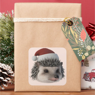 Sticker Carré Hérisson ou opossum de Noël portant un costume de