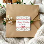 Sticker Carré Joyeuses fêtes Mistletoe Red Bow Custom Christmas<br><div class="desc">Happy Holidays Mistletoe Red Bow Custom Christmas Stickers Étiquette dispose d'élégante et élégante aquarelle verte mélodie florale accentuée avec un arc rouge avec le texte superposé "Happy Holidays" dans la typographie de script de calligraphie moderne et personnalisée avec votre nom de famille ou texte personnalisé. Ajoutez une touche de finition...</div>