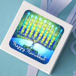 Sticker Carré Joyeux Hanoukka Artsy Turquoise bleu vert Menorah<br><div class="desc">"Bonne Hanoukka." Une photo de fond d'une menorah bleu, colorée et brillante vous aide à inaugurer les vacances d'Hanoukka. Sentez la chaleur et la joie de la saison des Fêtes chaque fois que vous utilisez cet impressionnant autocollant Hanoukka coloré. Des cartes de correspondance, des timbres, des sacs fourre-tout, des plateaux...</div>