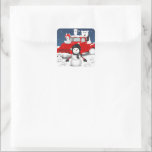 Sticker Carré Laisser neiger<br><div class="desc">This design feobjets the nostalgia of a vintage red truck with some Arctic animals and a snowman in a wintry scene.</div>