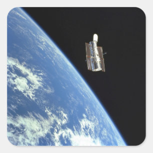 Sticker Carré Le télescope spatial Hubble avec une terre bleue