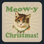 Sticker Carré Meow-y Christmas, Cute Holiday Cat Animal<br><div class="desc">Célébrez Noël avec cette mignonne amie en peluche,  elle est tellement adorable avec un collier vert avec trois cloches et Meow-y Christmas dans une police rétro vintage agitant sur le dessus. Meowy Noël !</div>