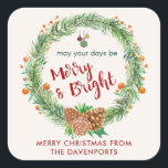 Sticker Carré Merry & Bright Christmas Wreath<br><div class="desc">Un autocollant de Noël personnalisé avec une couronne d'aquarelle. Seringues de pin vert,  cônes de pin et baies décoratives composent cette couronne festive. À l'intérieur de la couronne sont quelques ornements décoratifs et les mots" mai vos jours être Joyeux et lumineux. Écrit dans une police rouge tendance.</div>