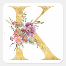 Monogramme or lettre K avec fleurs