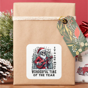 Sticker Carré Père Noël squelette jouant de la guitare Noël